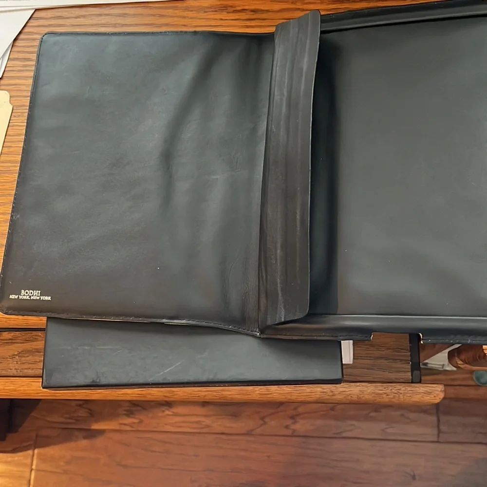 iPad convertible jacket by Bisho small leather goods.
